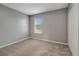 Spacious bedroom with window and double closets at 1107 Seminole Sky Dr, Ruskin, FL 33570