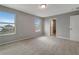 Well-lit bedroom featuring two large windows at 1107 Seminole Sky Dr, Ruskin, FL 33570