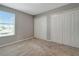 Bright bedroom with window and double closets at 1107 Seminole Sky Dr, Ruskin, FL 33570