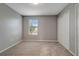 Large bedroom with window and double closets at 1107 Seminole Sky Dr, Ruskin, FL 33570