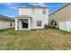 View of the back of the house and yard at 1107 Seminole Sky Dr, Ruskin, FL 33570