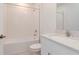 Clean bathroom with white subway tiles, quartz countertop, and bathtub at 11307 Linden Depot Rd, San Antonio, FL 33576
