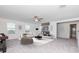 Spacious bonus room with a large TV and comfortable seating at 11307 Linden Depot Rd, San Antonio, FL 33576