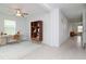 Bright home office with built-in shelving and hardwood floors at 11307 Linden Depot Rd, San Antonio, FL 33576