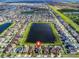 Aerial view of the house and surrounding community at 11514 Brighton Knoll Loop, Riverview, FL 33579