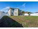 Large backyard with grassy area and privacy fence at 11514 Brighton Knoll Loop, Riverview, FL 33579