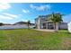 Large backyard with patio and palm trees at 11514 Brighton Knoll Loop, Riverview, FL 33579