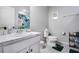 Clean bathroom with a toilet, sink, and green rug at 11514 Brighton Knoll Loop, Riverview, FL 33579