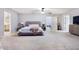 Main bedroom with plush carpet and ensuite bathroom at 11514 Brighton Knoll Loop, Riverview, FL 33579