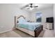 Bright bedroom with a double bed and TV at 11514 Brighton Knoll Loop, Riverview, FL 33579