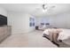 Spacious bedroom with large windows and plush carpet at 11514 Brighton Knoll Loop, Riverview, FL 33579
