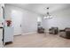 Bright living room featuring hardwood floors and comfy seating at 11514 Brighton Knoll Loop, Riverview, FL 33579