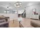 Open living area with a view of the kitchen and stairs at 11514 Brighton Knoll Loop, Riverview, FL 33579