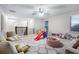Spacious loft area with a comfortable couch and a ball pit at 11514 Brighton Knoll Loop, Riverview, FL 33579