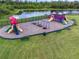 Community playground with swings and play structures at 11514 Brighton Knoll Loop, Riverview, FL 33579