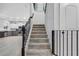 Elegant staircase with an ornate railing at 11514 Brighton Knoll Loop, Riverview, FL 33579