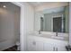 Modern bathroom with double vanity and a walk-in shower at 12140 Cattleside Dr, Riverview, FL 33579