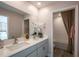 Spa-like bathroom with double vanity and walk-in shower at 12144 Cattleside Dr, Riverview, FL 33579