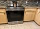 Stainless steel appliances and granite countertops at 12411 Cavalier Ct, Hudson, FL 34669