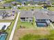 Aerial view of house with pool and backyard, located near the lake at 12854 Boggy Creek Dr, Riverview, FL 33579