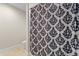 Small bathroom with shower and patterned curtain at 12854 Boggy Creek Dr, Riverview, FL 33579