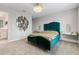 Stylish bedroom with a velvet headboard and gold accents at 12854 Boggy Creek Dr, Riverview, FL 33579