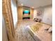 Bedroom with modern fireplace and wall-mounted TV at 12854 Boggy Creek Dr, Riverview, FL 33579