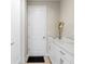Bright entryway with white cabinets and quartz countertop at 12854 Boggy Creek Dr, Riverview, FL 33579
