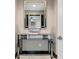 Elegant entryway with a mirrored console table at 12854 Boggy Creek Dr, Riverview, FL 33579