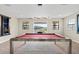 Game room with pool table and balcony view at 12854 Boggy Creek Dr, Riverview, FL 33579
