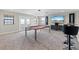 Game room with pool table, TV, and bar area at 12854 Boggy Creek Dr, Riverview, FL 33579