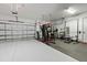 Garage converted into home gym with various equipment at 12854 Boggy Creek Dr, Riverview, FL 33579