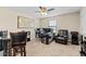 Home office with desk, seating, and multiple monitors at 12854 Boggy Creek Dr, Riverview, FL 33579