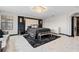 Main bedroom with marble floors and a comfy sitting area at 12854 Boggy Creek Dr, Riverview, FL 33579