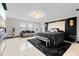 Spacious main bedroom with marble floors and a plush bed at 12854 Boggy Creek Dr, Riverview, FL 33579