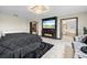 Spacious main bedroom with fireplace, large TV, and ensuite bathroom at 12854 Boggy Creek Dr, Riverview, FL 33579