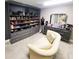 Spacious walk-in closet with custom shelving and seating area at 12854 Boggy Creek Dr, Riverview, FL 33579