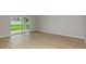 Living room with sliding doors leading to the backyard at 14729 Summer Branch Dr, Lithia, FL 33547