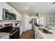 Modern kitchen with white cabinets and stainless steel appliances at 14741 Summer Branch Dr, Lithia, FL 33547