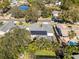 Aerial view of house with solar panels and pool at 1626 Spottswood Cir, Palm Harbor, FL 34683