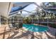 Inviting screened pool and patio perfect for entertaining at 1626 Spottswood Cir, Palm Harbor, FL 34683