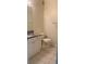 Clean bathroom with granite countertops and white vanity at 18001 Richmond Place Dr # 125, Tampa, FL 33647