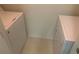 Laundry room with washer and dryer included at 18001 Richmond Place Dr # 125, Tampa, FL 33647
