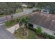 Aerial view showing house, landscaping, and driveway at 2035 Hampstead Cir # 275, Sun City Center, FL 33573