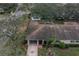 Aerial view of house and surrounding neighborhood at 2035 Hampstead Cir # 275, Sun City Center, FL 33573