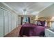 Spacious bedroom with a king-size bed and built-in closet at 2035 Hampstead Cir # 275, Sun City Center, FL 33573