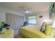 Cozy bedroom with a queen bed and built-in closet at 2035 Hampstead Cir # 275, Sun City Center, FL 33573