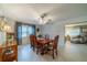 Bright dining room featuring a wood table and chairs, ready to host gatherings at 2035 Hampstead Cir # 275, Sun City Center, FL 33573