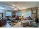 Relaxing living room, featuring a sectional sofa and a coffee table at 2035 Hampstead Cir # 275, Sun City Center, FL 33573