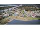 Aerial view of lakefront community with various homes at 2420 Allegheny Valley St, Ruskin, FL 33570